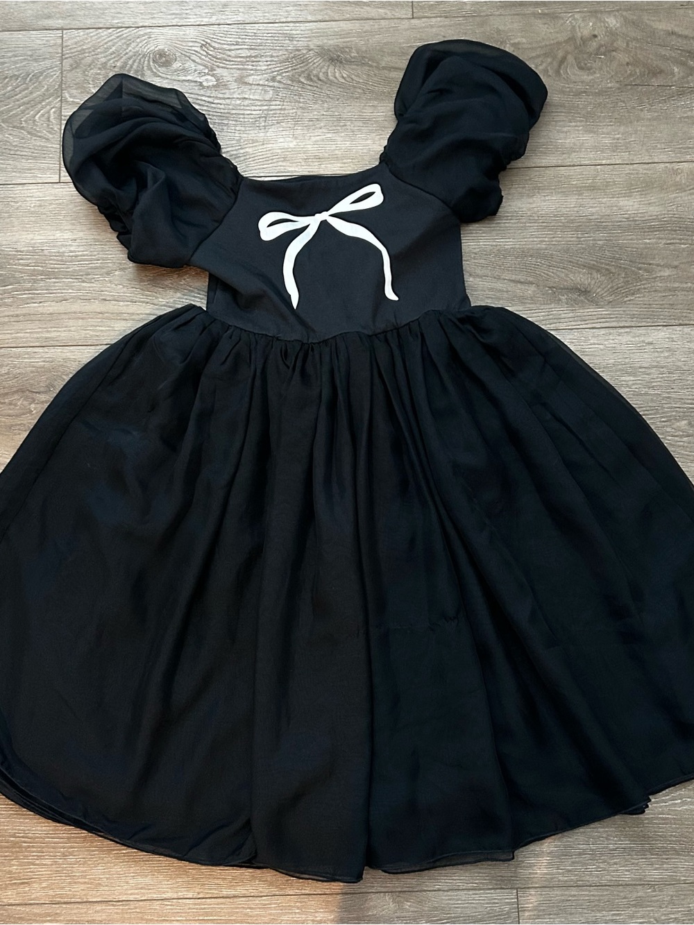 Black Puff-Sleeve Kids Costume Dress with White Bow Accent
